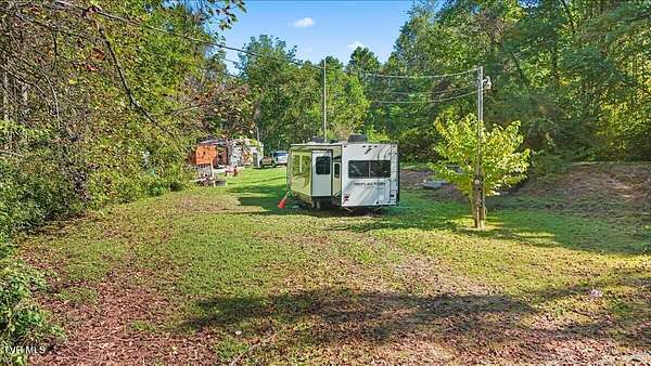 4.72 Acres of Residential Land with Home for Sale in Elizabethton, Tennessee