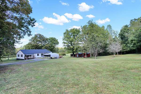 13 Acres of Land with Home for Sale in Delano, Tennessee