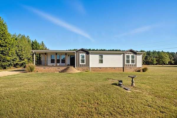 3.3 Acres of Residential Land with Home for Sale in Calhoun City, Mississippi