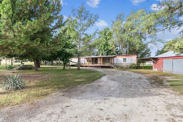 2.3 Acres of Residential Land with Home for Auction in Augusta, Kansas