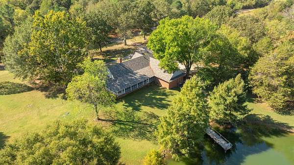 5 Acres of Residential Land with Home for Sale in Moscow, Tennessee