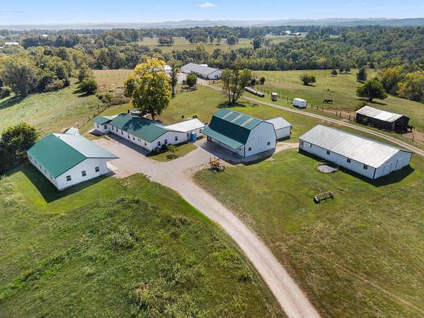90.4 Acres of Agricultural Land with Home for Sale in Owingsville, Kentucky