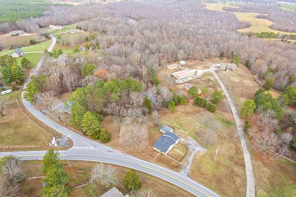 5 Acres of Land with Home for Sale in Indian Mound, Tennessee