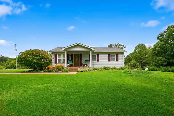 2.5 Acres of Land with Home for Sale in Clay City, Kentucky