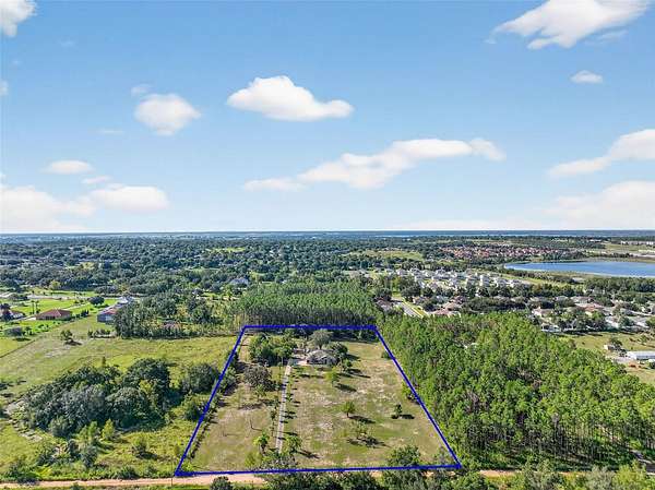 4.8 Acres of Land with Home for Sale in Clermont, Florida