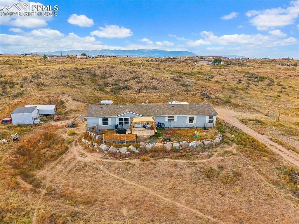 7.6 Acres of Residential Land with Home for Sale in Fountain, Colorado