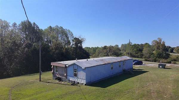 1.85 Acres of Residential Land with Home for Sale in Edmonton, Kentucky