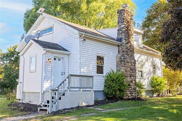 3.5 Acres of Residential Land with Home for Sale in Churchville, New York