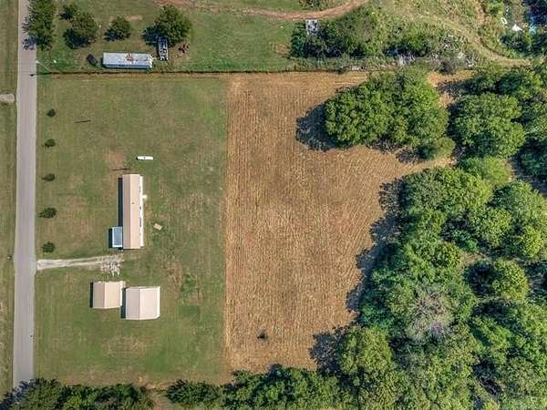 4.85 Acres of Residential Land with Home for Sale in Claremore, Oklahoma