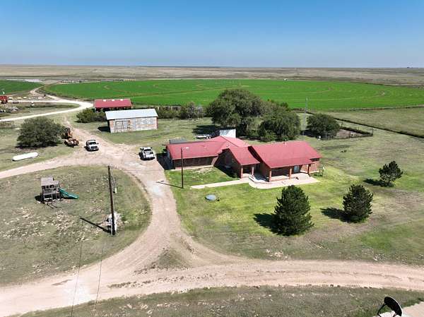 12.4 Acres of Land with Home for Sale in Stratford, Texas