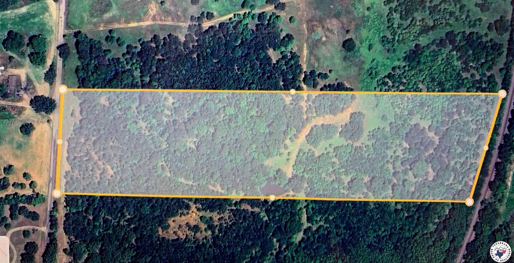 15.8 Acres of Recreational Land for Sale in Atlanta, Texas