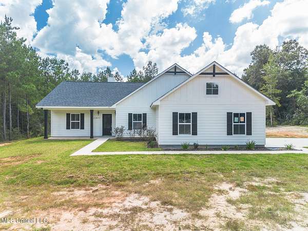 4.4 Acres of Residential Land with Home for Sale in Saucier, Mississippi
