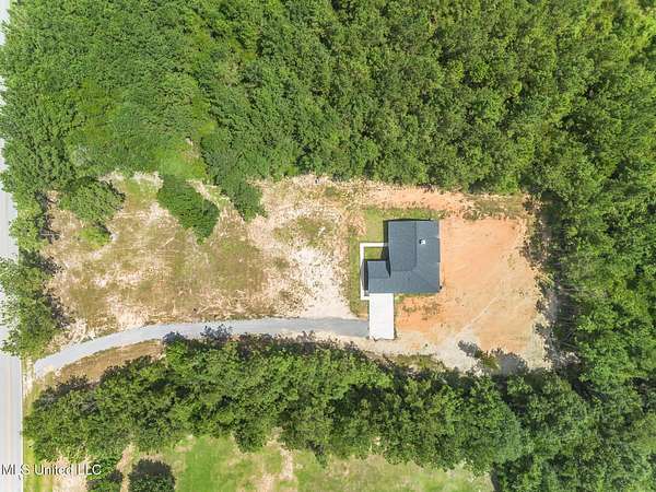 4.4 Acres of Residential Land with Home for Sale in Saucier, Mississippi