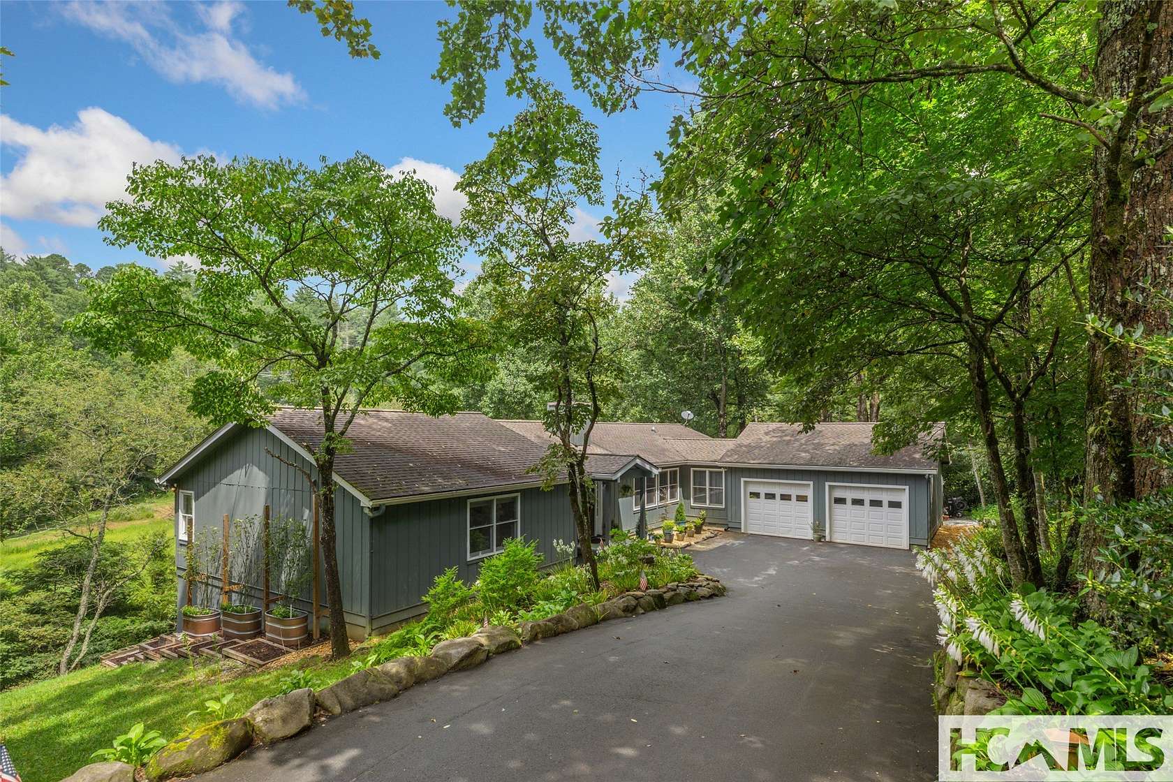 3 Acres of Residential Land with Home for Sale in Highlands, North Carolina