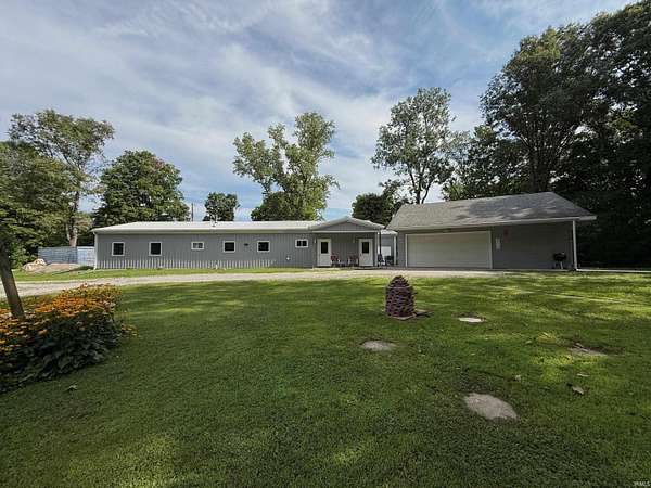 6 Acres of Land with Home for Auction in Pierceton, Indiana
