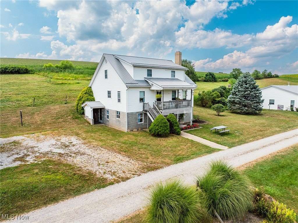 28.4 Acres of Recreational Land with Home for Auction in Fresno, Ohio