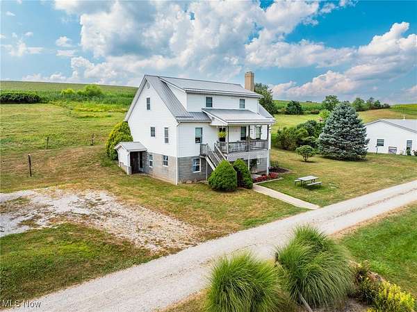 28.4 Acres of Recreational Land with Home for Auction in Fresno, Ohio