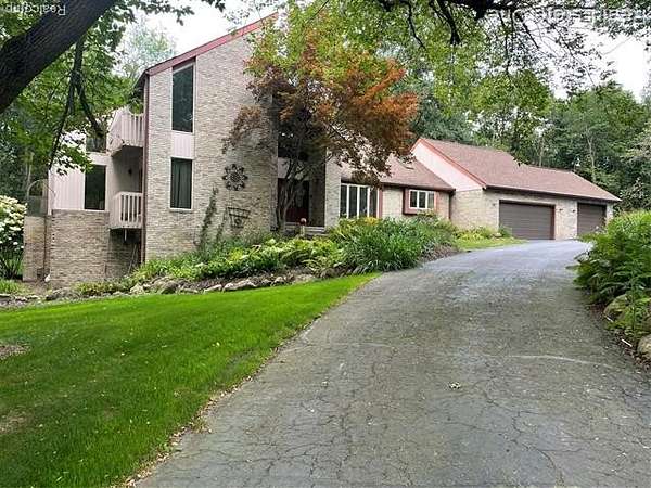 3 Acres of Residential Land with Home for Sale in Milford, Michigan