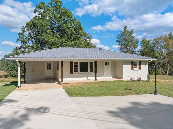 5 Acres of Residential Land with Home for Sale in Bath Springs, Tennessee