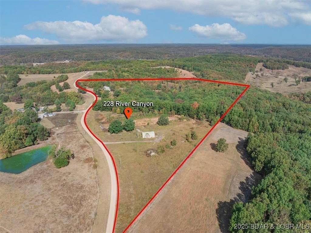 43.5 Acres of Recreational Land with Home for Sale in Macks Creek, Missouri