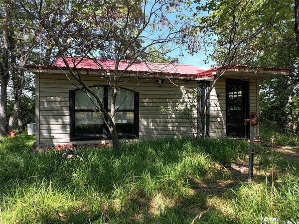 7.3 Acres of Residential Land with Home for Sale in Luther, Oklahoma