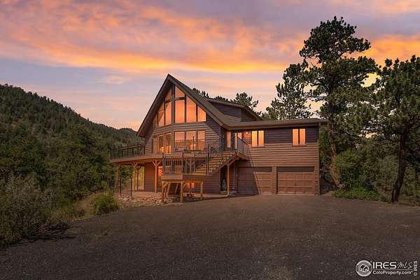 4.64 Acres of Residential Land with Home for Sale in Glen Haven, Colorado