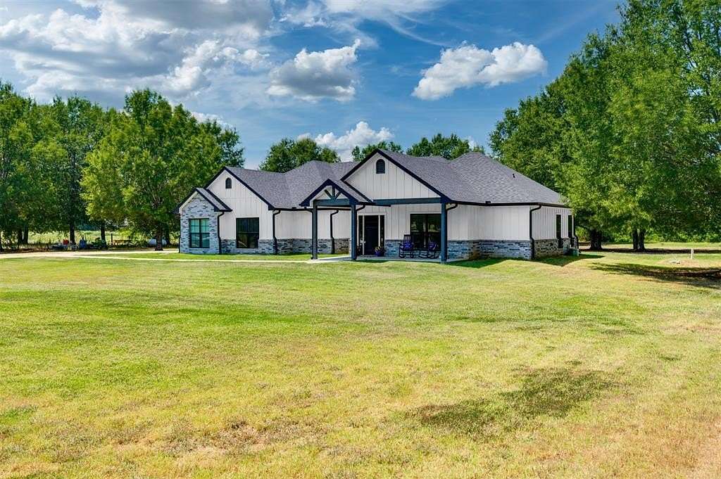 1.9 Acres of Residential Land with Home for Sale in Blossom, Texas