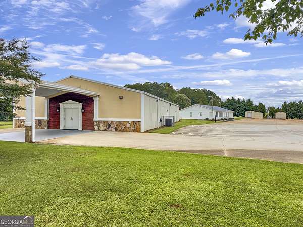 4.26 Acres of Improved Commercial Land for Sale in Covington, Georgia
