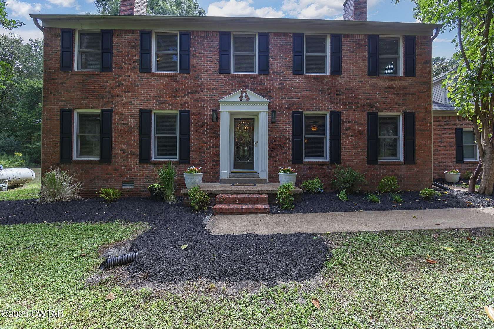 3.8 Acres of Residential Land with Home for Sale in Jackson, Tennessee