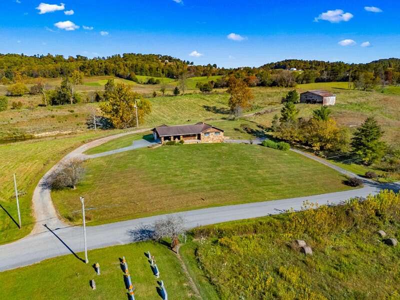 5 Acres of Residential Land with Home for Sale in Thorn Hill, Tennessee
