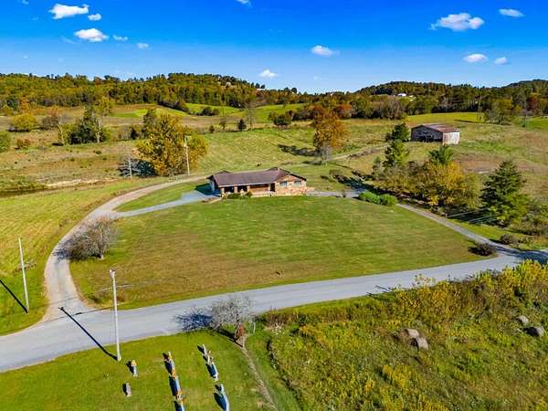 5 Acres of Residential Land with Home for Sale in Thorn Hill, Tennessee