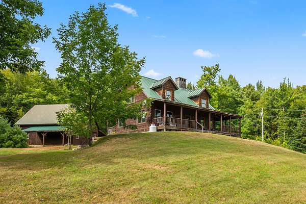 12.1 Acres of Recreational Land with Home for Sale in Lyman Town, New Hampshire