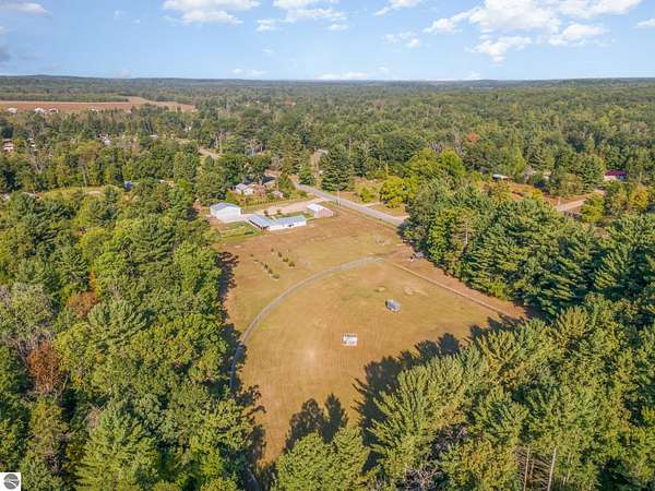 37.8 Acres of Land with Home for Sale in Harrison, Michigan