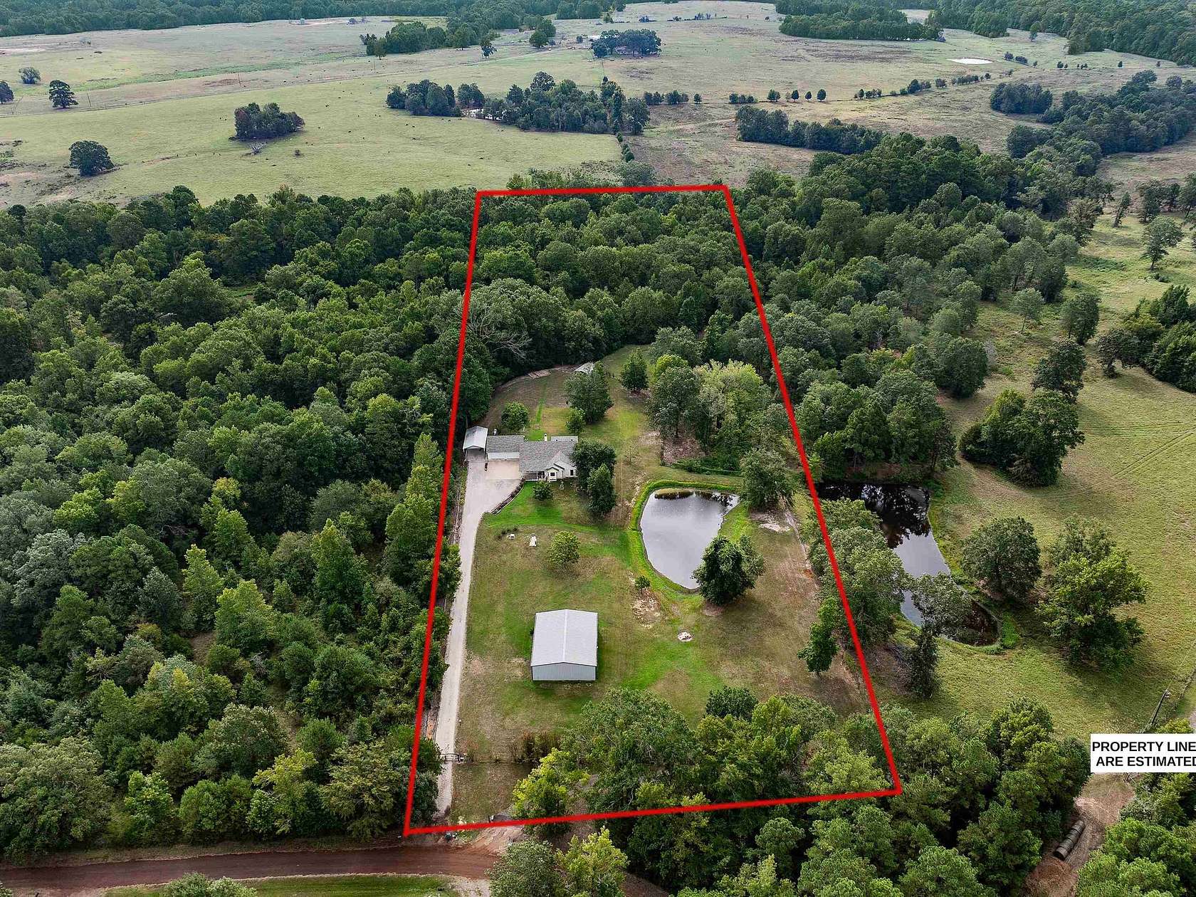 10 Acres of Residential Land with Home for Sale in Long Branch, Texas