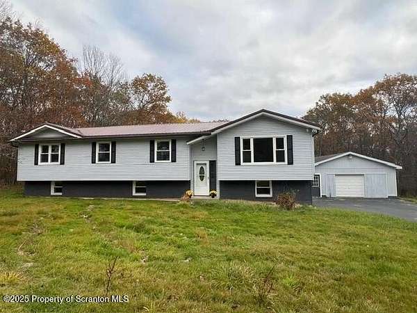 1.5 Acres of Residential Land with Home for Sale in Clifford Township, Pennsylvania