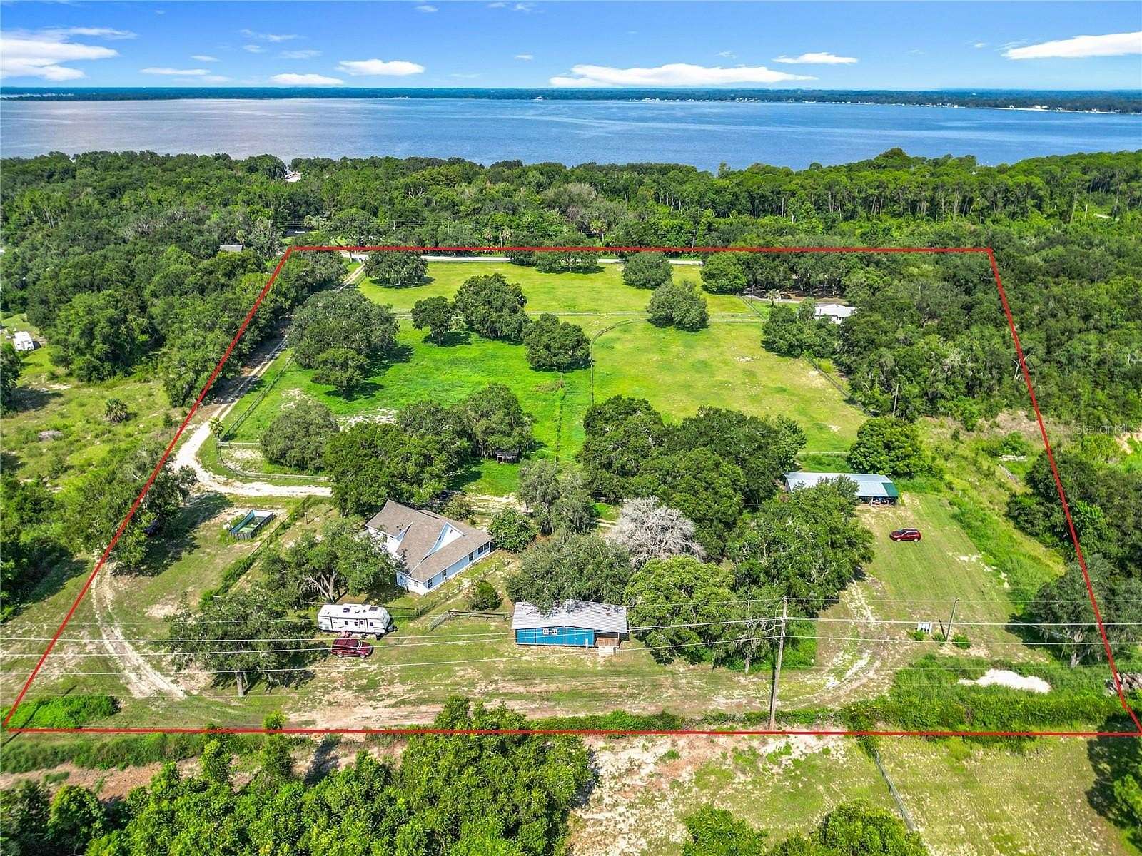 9.8 Acres of Land with Home for Sale in East Lake Weir, Florida