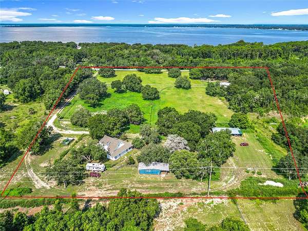 9.8 Acres of Land with Home for Sale in East Lake Weir, Florida