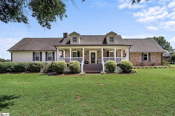 5.86 Acres of Land with Home for Sale in Gray Court, South Carolina