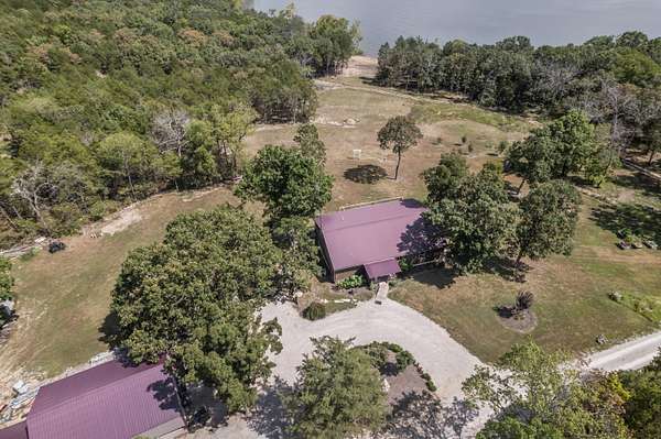5.77 Acres of Land with Home for Sale in Shell Knob, Missouri