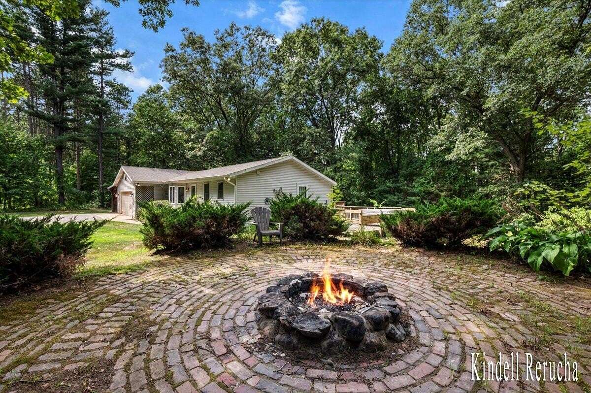 4.68 Acres of Residential Land with Home for Sale in Lowell, Michigan