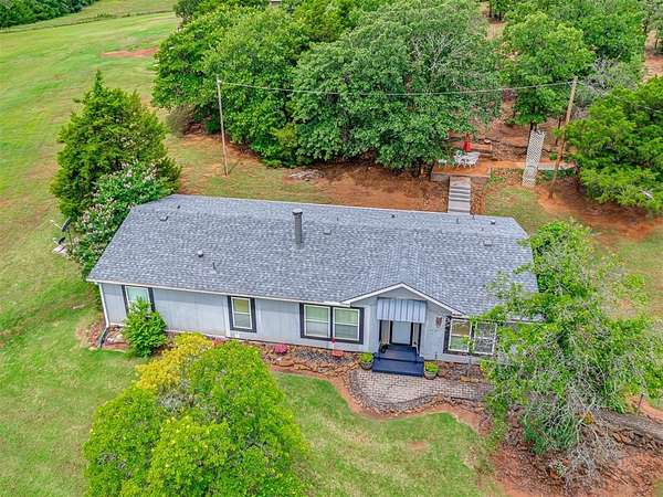 5 Acres of Land with Home for Sale in Edmond, Oklahoma