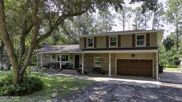 5 Acres of Residential Land with Home for Sale in Port Orange, Florida