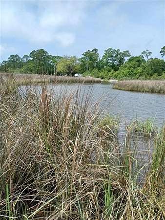 11.7 Acres of Land for Sale in Coden, Alabama