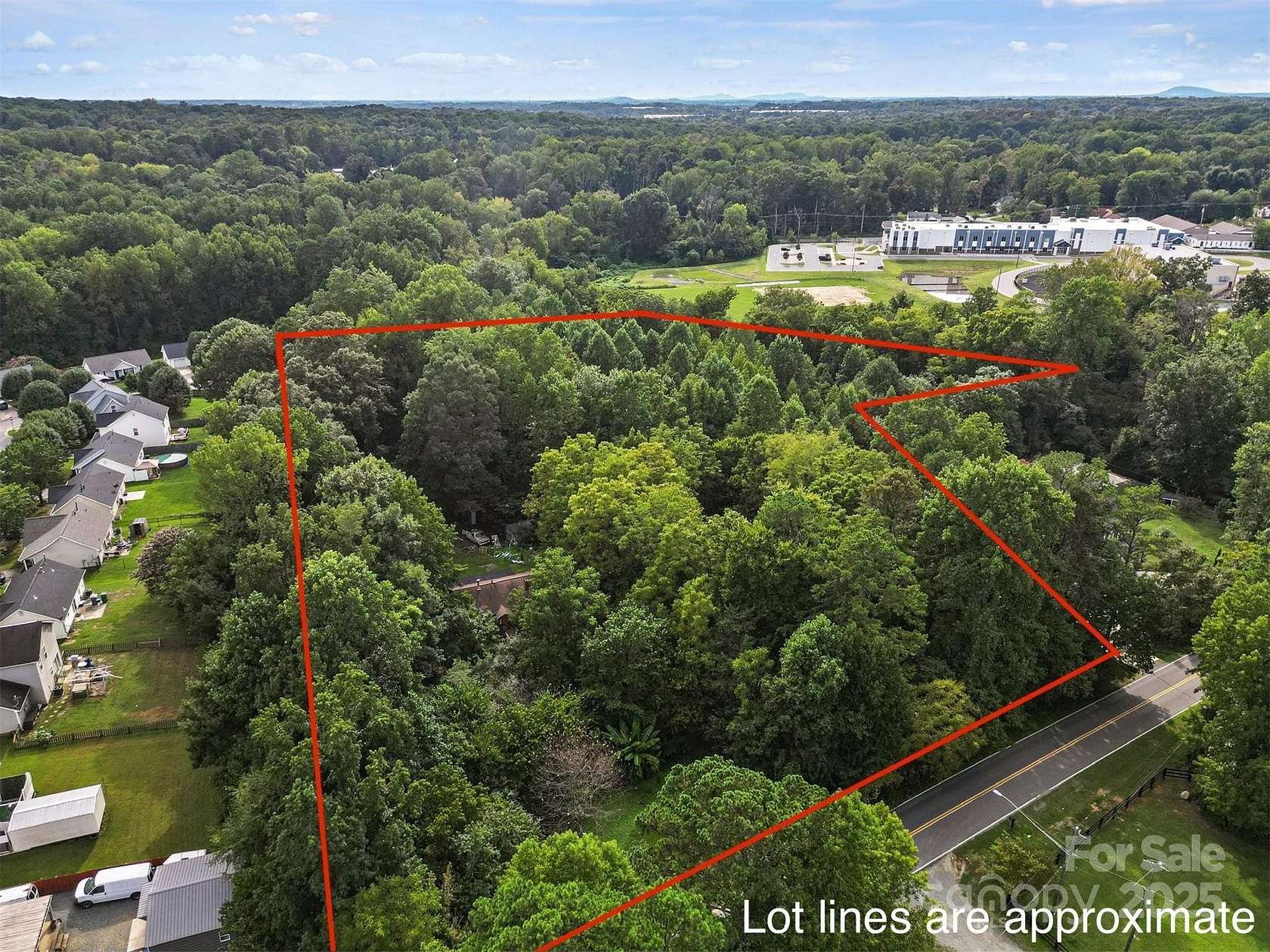 4.54 Acres of Residential Land with Home for Sale in Charlotte, North Carolina