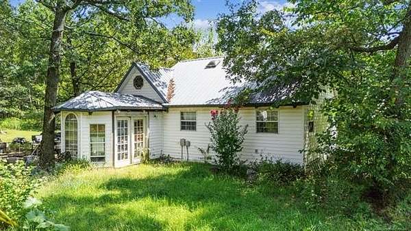 190 Acres of Land with Home for Sale in Tahlequah, Oklahoma