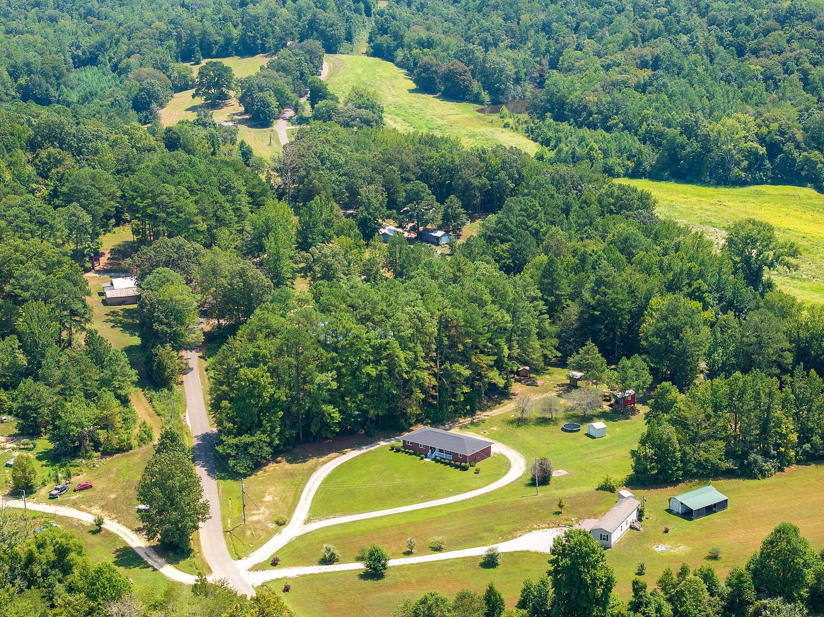 3.8 Acres of Residential Land with Home for Sale in Parsons, Tennessee