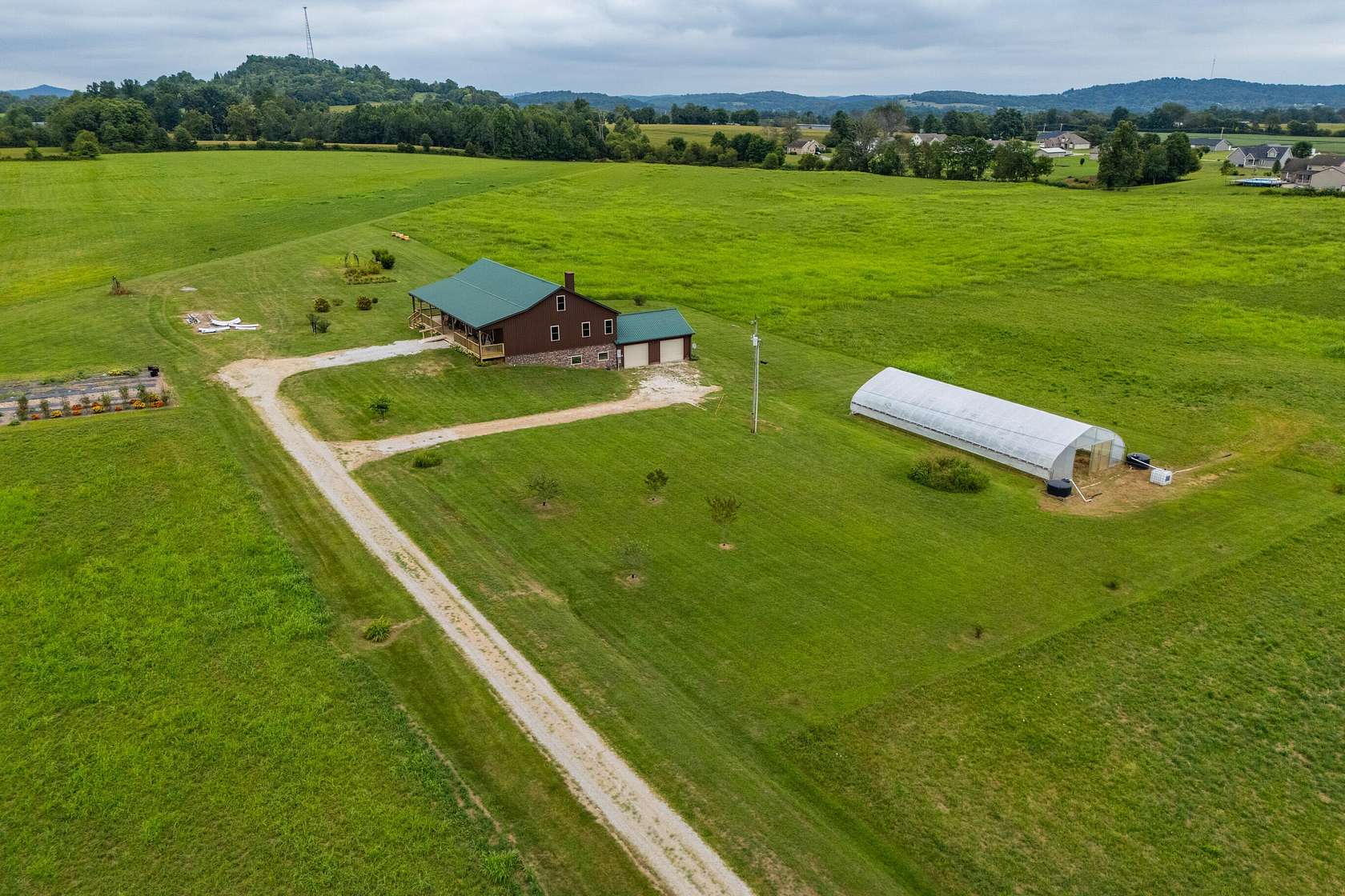 62 Acres of Land with Home for Sale in Brodhead, Kentucky