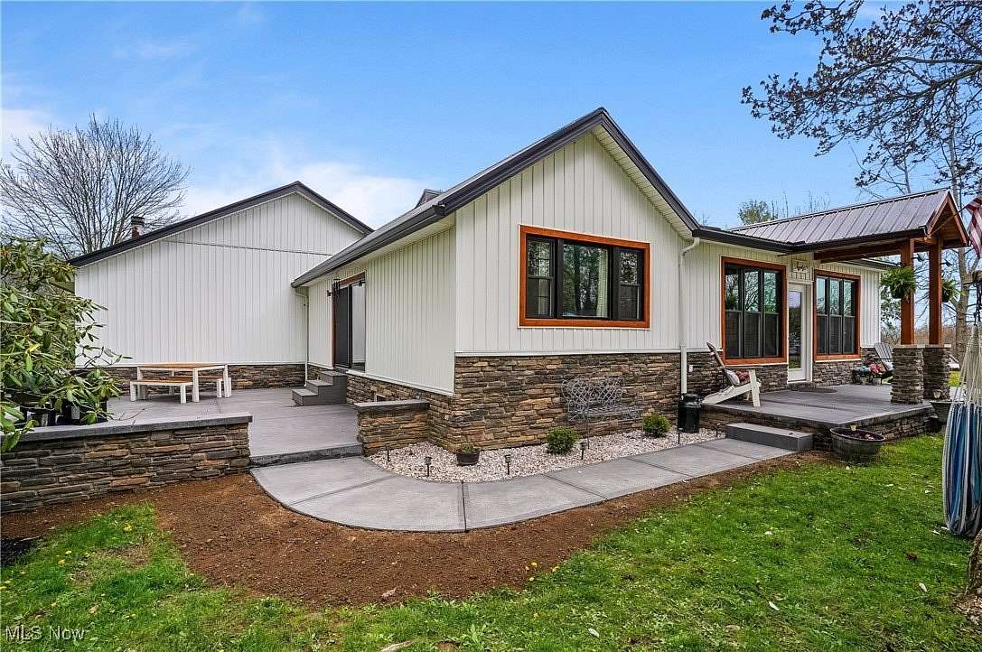 5.3 Acres of Residential Land with Home for Sale in New Franklin, Ohio