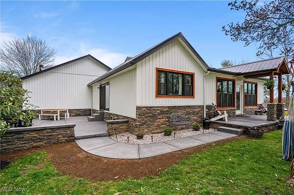 5.3 Acres of Residential Land with Home for Sale in New Franklin, Ohio