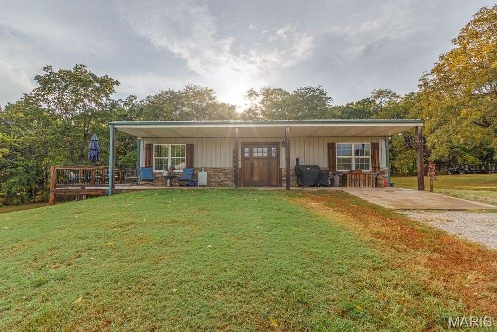 6.63 Acres of Residential Land with Home for Sale in Lebanon, Missouri